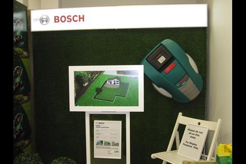 The wireless Bosch robotic lawnmower cuts grass unaided